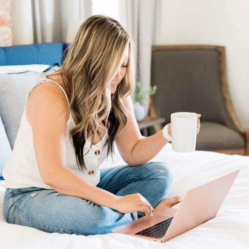 Girl creating a landing page on her laptop